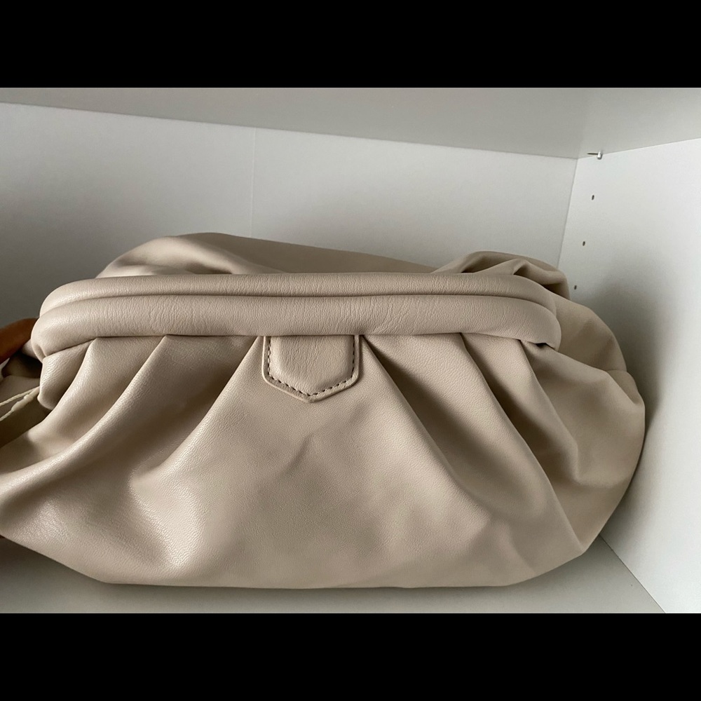 Nude brand new pouch bag